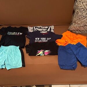Kids Bundle


Hurley Black Tee with Mixed Bright Kids Shorts